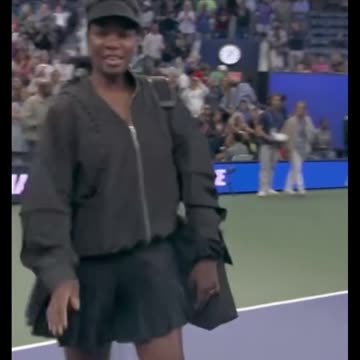 @venuswilliams takes the court at the US Open in a custom Merino wool performance kit dress,