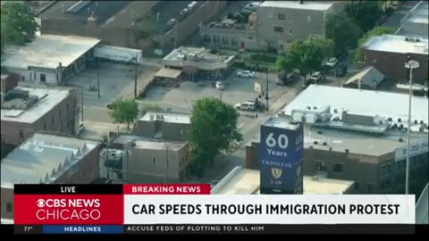 Car Drives Through A Immigration Protest In Chicago