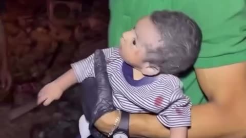 This Palestinian infant was pulled alive from beneath the rubble of their destroyed home