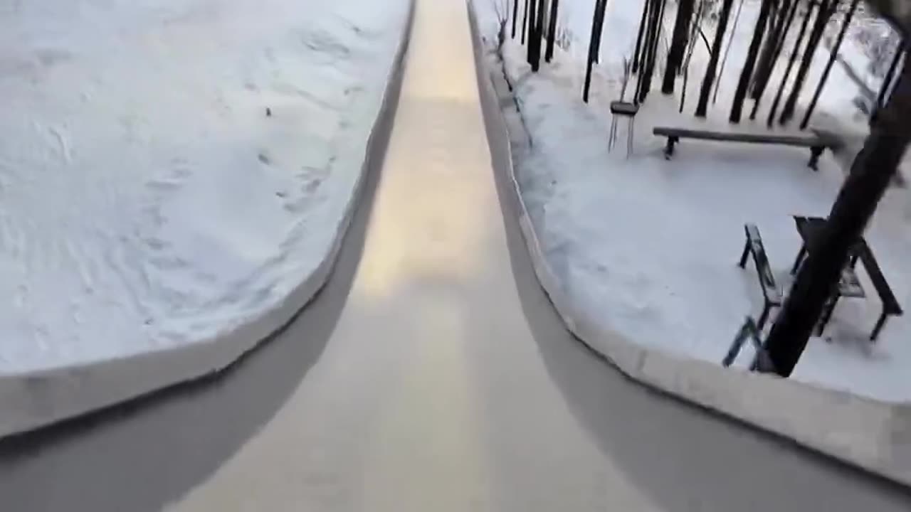 Surfing the ice slope ❄️: slippery fun!