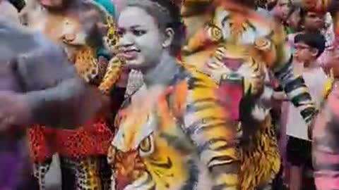 Irinjalakuda's Tigress: The Female Spirit of Pulikali Unleashed!