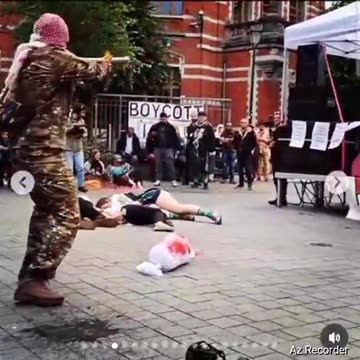 Brussels - Muslims dress up as terrorists and act out slaughtering ppl