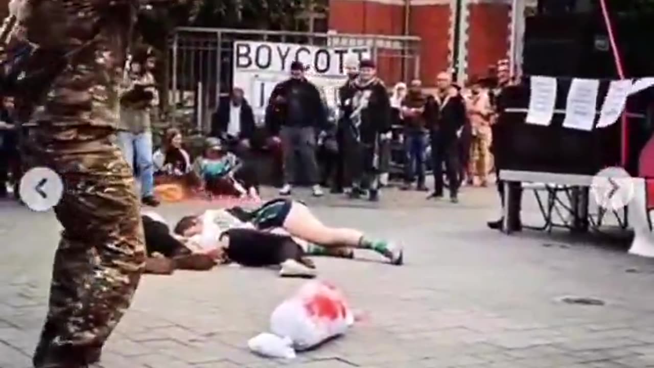 Brussels - Muslims dress up as terrorists and act out slaughtering ppl