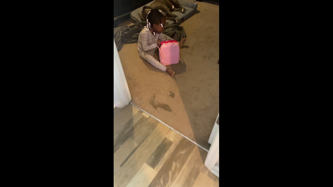 Hailey playing and blue just smiling