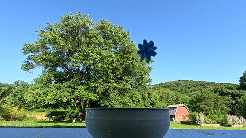Slow Motion Blue Spike Ball Drop / Splash