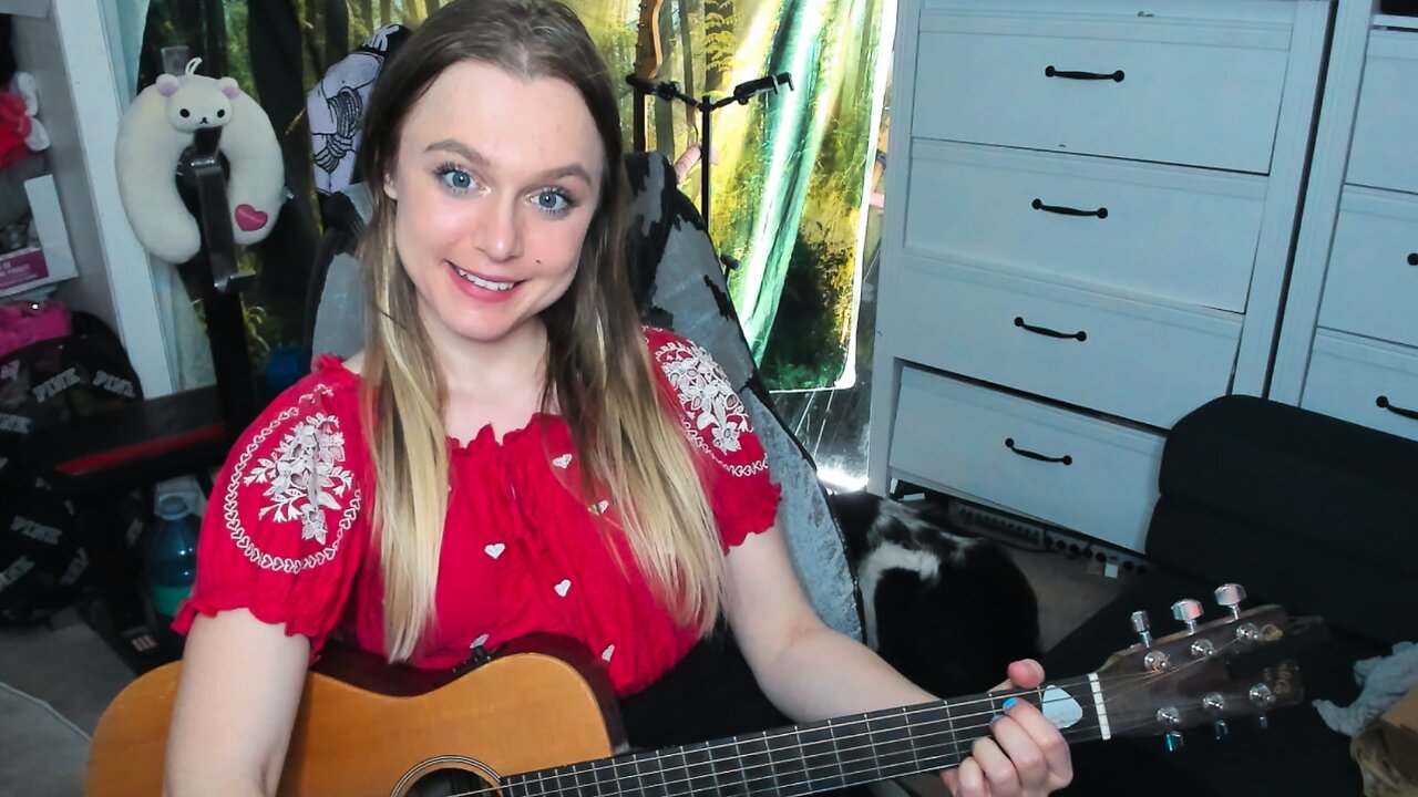 Busking - singing & playing guitar