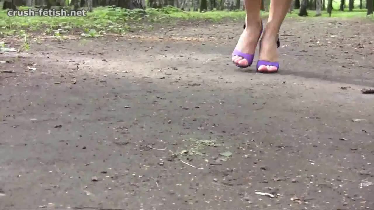 Walking in Purple High Heels on Dirt Path