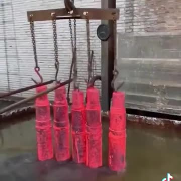 Cooling down red hot forged metal. Oddly satisfying.