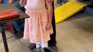 A Little Girl is Reflecting on Faith's Foundation