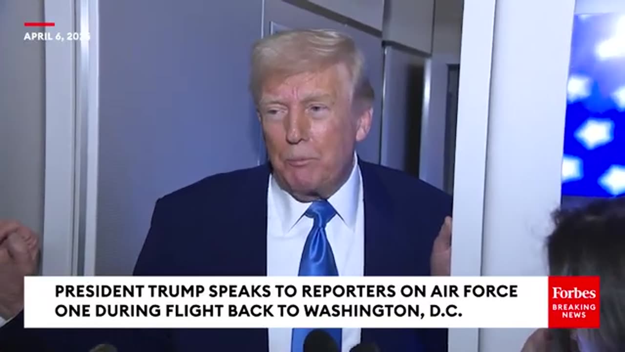 President Trump speaks to reporters aboard Air Force One April 6, 2025