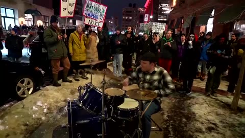 Protesters set off fireworks in Minneapolis march after ICE shooting