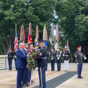 President Donald Trump lays a wreath at the Tomb of the Unknown Soldier.