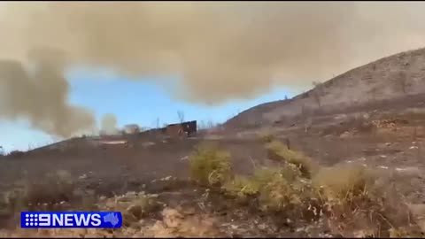Thousands evacuate as huge wildfire tears through southern France