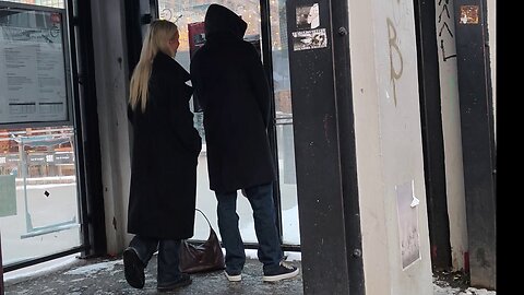 North wind and real feel -16°C froze a beautiful young woman in a autumn coat