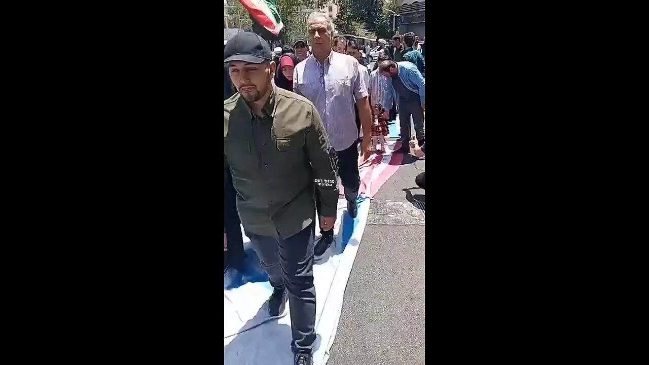Iranians just placed an Israeli and American flag on the floor to enter a main mosque.