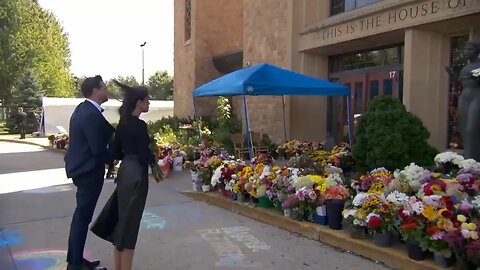 VP and SLOTUS lay flowers at Annunciation Catholic