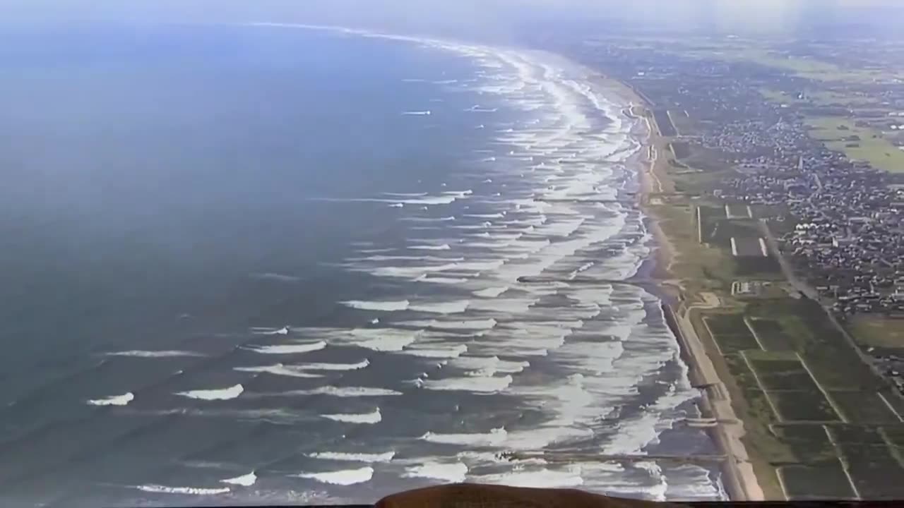 Tsunami waves hitting Japan