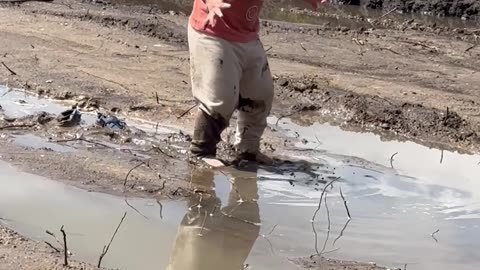 Son Gets Stuck Sinking In Mud