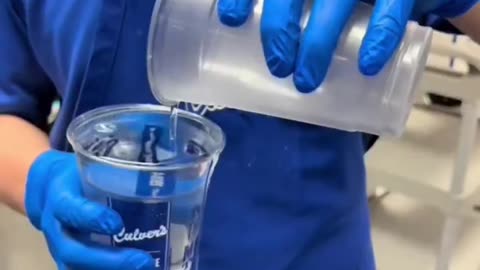 A culver employee shows you that they just changed their large cups,