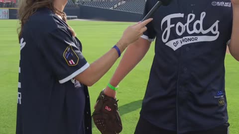 Zach Top with the official batting helmet of the @foldsofhonor celebrity softball game