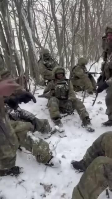 African Mercenaries Singing and Dancing While Waiting to be Disposed Of