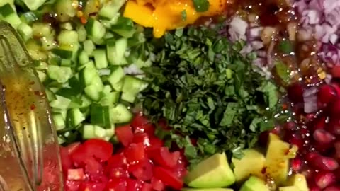 This is how to make a fresh salad using manggo, cucumber, and some other ingredients