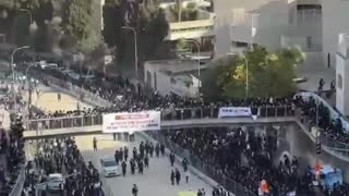 Thousands of ultra-Orthodox Jews, dressed in black, rallied in Jerusalem