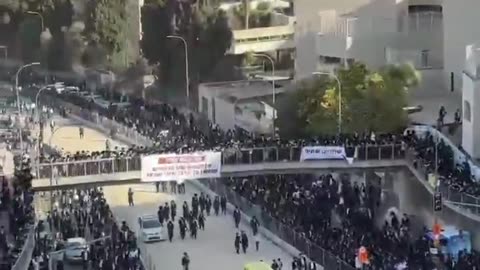 Thousands of ultra-Orthodox Jews, dressed in black, rallied in Jerusalem