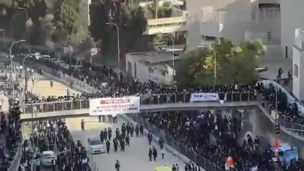 Thousands of ultra-Orthodox Jews, dressed in black, rallied in Jerusalem