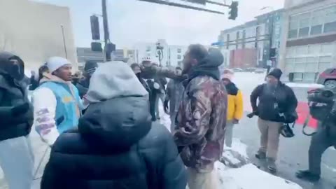 crowd shouts "he's one of us'" appearing to realize they attacked one of their own.