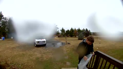 Delivery Driver Protects Competitors Packages From Rain