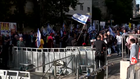 Anti-government protesters rally near Israeli PM's residence