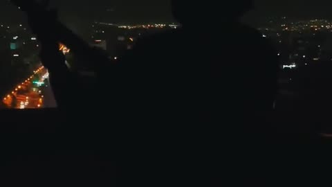 A haunting performance by an Iranian singer amid live fire over Tehran