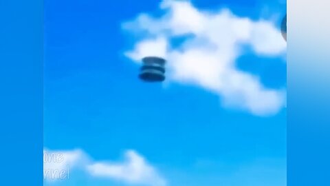 A Barrel-shaped UFO Caught on Video over Ontario, Canada