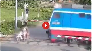 Another one. They thought they could beat the train. Crossing arms down. Whistle blowing