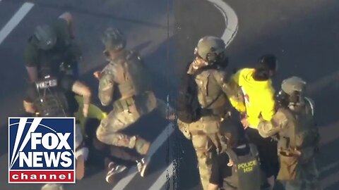 CAUGHT ON LIVE TV: Authorities sprint toward man in dramatic takedown