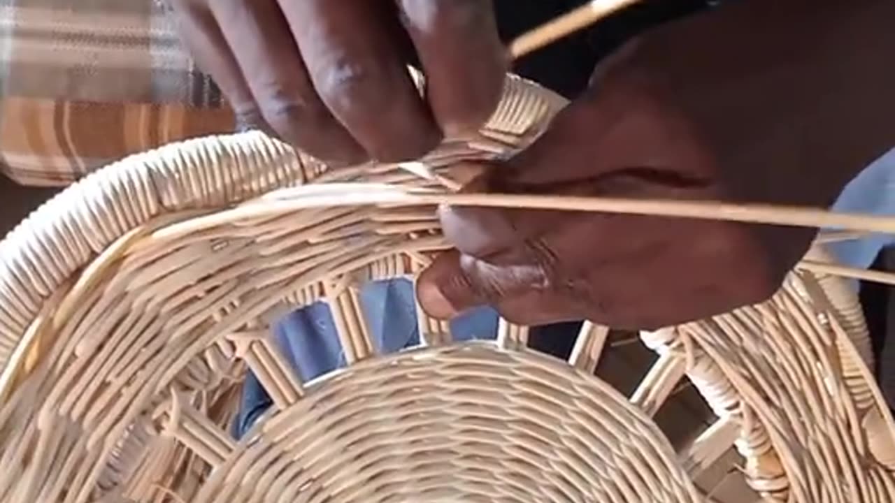 Weaving a rattan chair