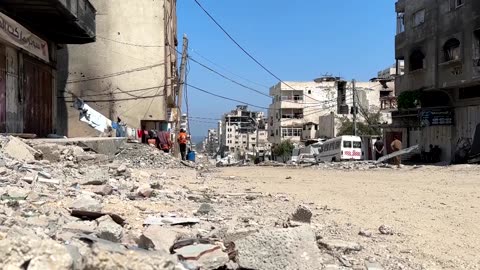 Video captures people running for cover as Israeli strike hits Gaza