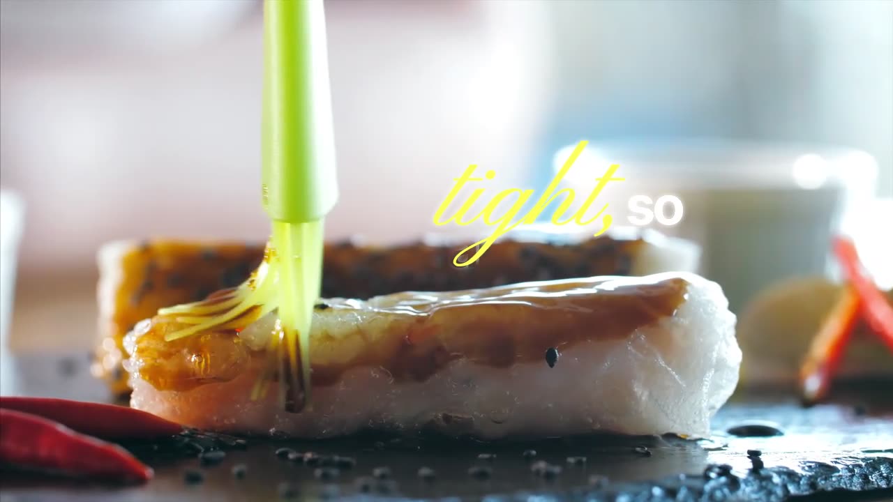 Crispy Cheesecake Egg Rolls — Strawberry Glaze and Powdered Sugar