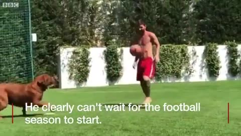 Messi has a kickabout with his dog