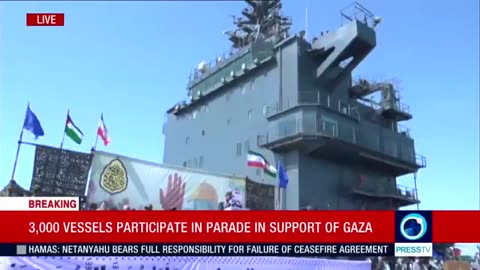 Live footage shows a massive naval parade underway in Bandar Abbas, Iran