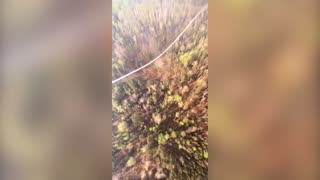 Aerial footage shows helicopter fighting Minnesota wildfires