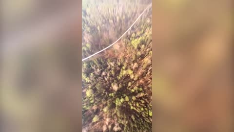 Aerial footage shows helicopter fighting Minnesota wildfires