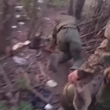 Wounded Russian Soldier Still Going