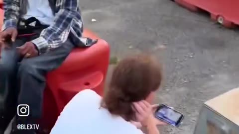 Black attacks homeless woman