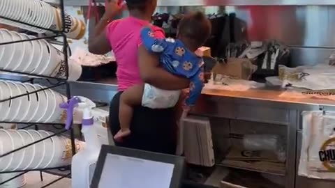Church’s Chicken woman goes behind the counter with her baby