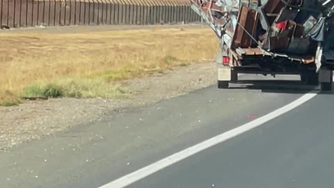 Suspiciously Swaying Load Of Towed Garbage