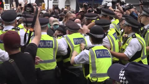 Protesters And Police Clash Outside Thistle City Barbican Hotel