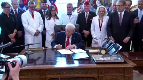 President Trump signs.......