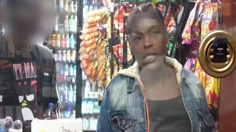 Negress threatens clerk over being called sir - no social grace or humility
